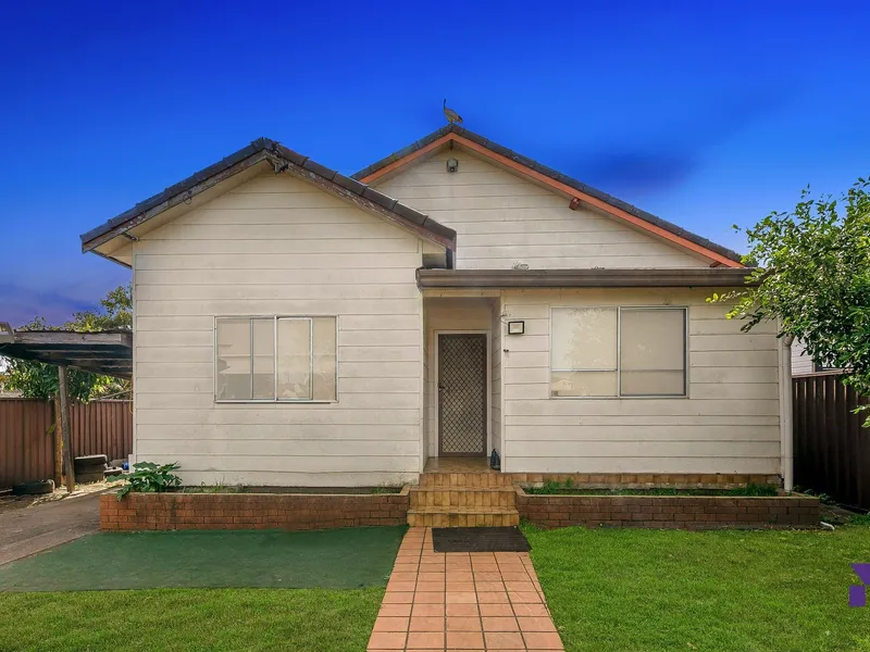 North-facing family home with second dwelling occupies a central location