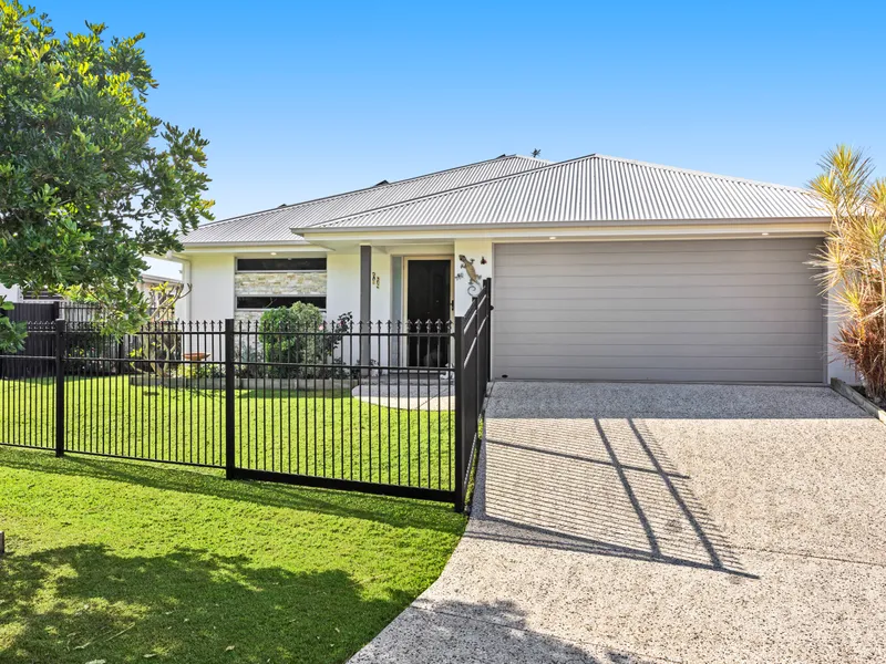 Exquisite Family Home in Caloundra West with Hamptons Inspired Kitchen and Eco-Friendly Features