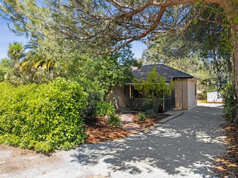 Charming, solid-brick home with a large yard for the kids