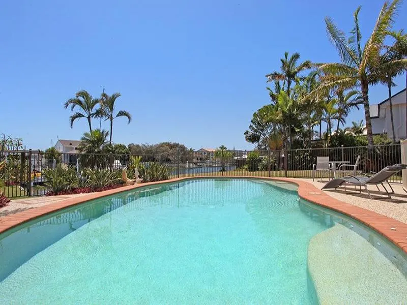 LARGE CANAL HOME WITH INGROUND POOL & PONTOON 