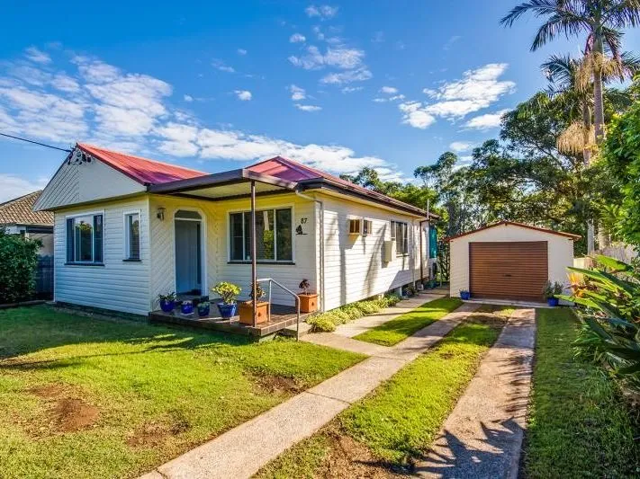 QUAINT FAMILY HOME WITH LARGE BACKYARD