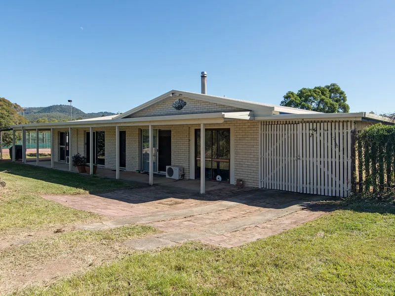 Family Brick Home on 12 Acres Close to Amenities!