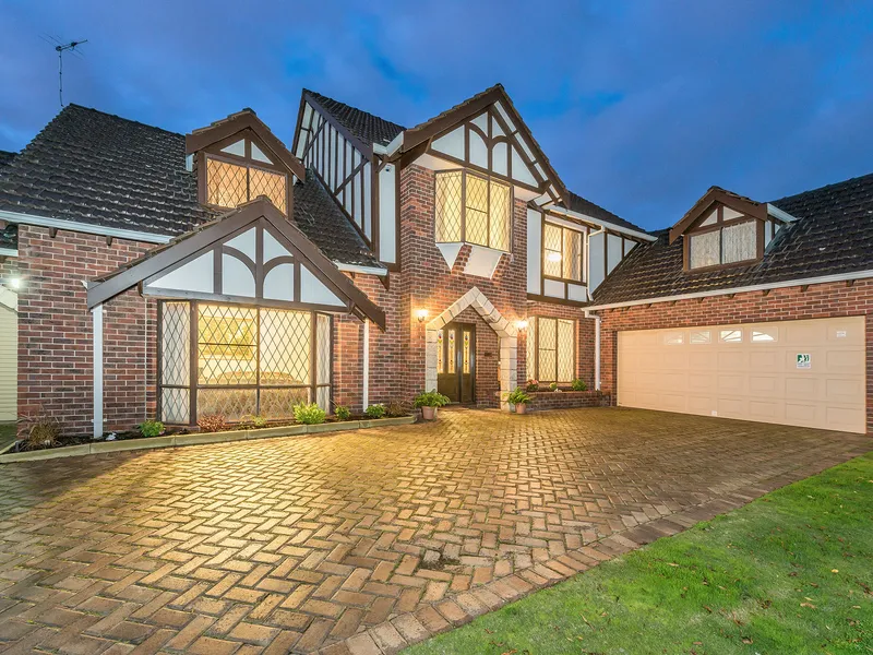 Elevated Tudor Style Residence