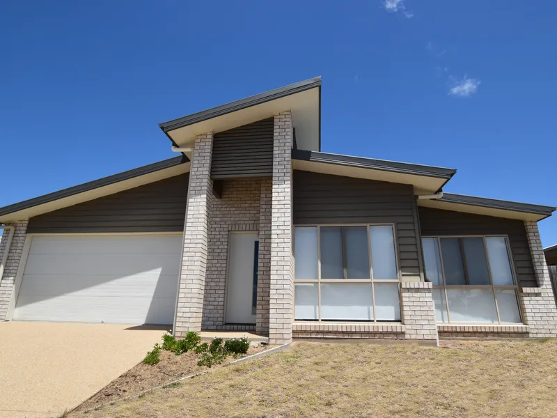 NEAT AND COMPLETE... ELEVATED BLOCK... LOW MAINTENANCE