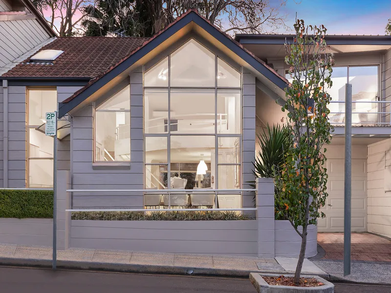 Unique residence in quiet pocket steps to village heart