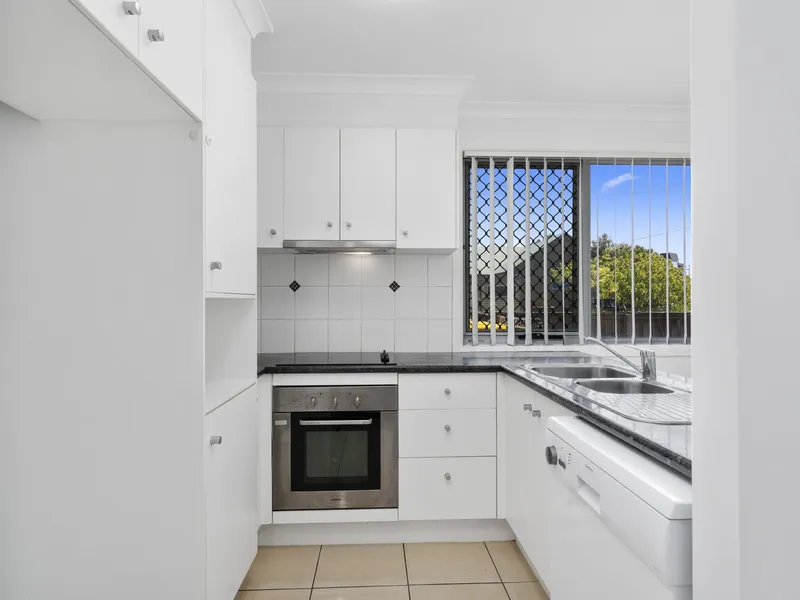 Nestled in the heart of Caboolture, this contemporary townhouse offers modern living in a serene, well-maintained complex.