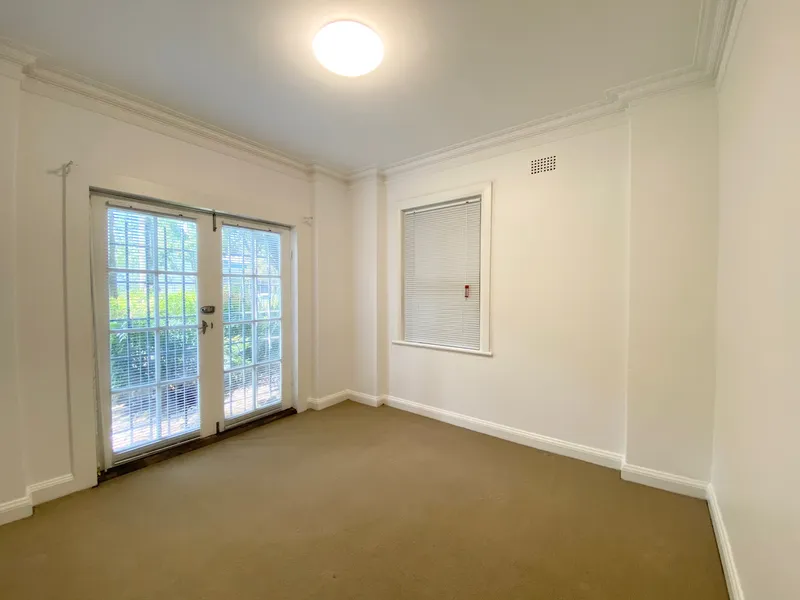 PERFECTLY POSITIONED ONE BEDROOM PLUS A STUDY!