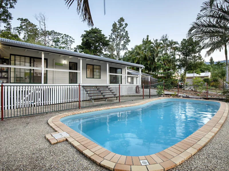 Sleek and modern family home on a large, lush lot