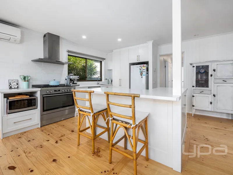 CUTE 3 BEDROOM HOME RIGHT IN THE MIDDLE OF THE FRONT AND BACK BEACH!!!