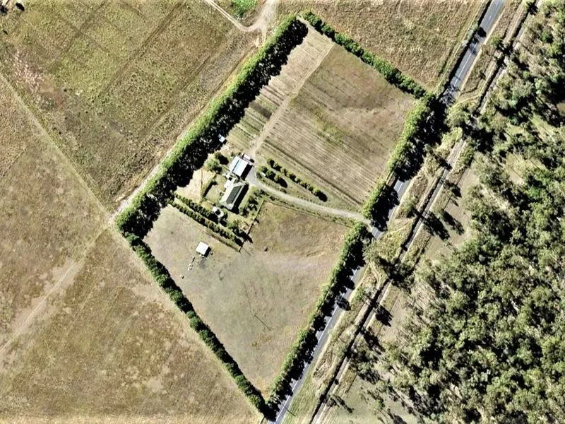 BEAUTIFUL ACREAGE WITH STUNNING HOME!