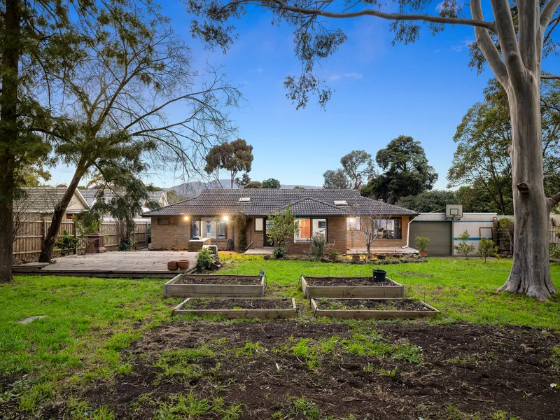 Stylish family abode embraced by a lush leafy landscape
