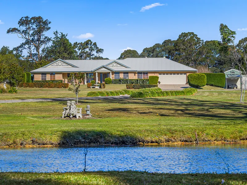 Picturesque Acreage Living with Convenience at Your Fingertips