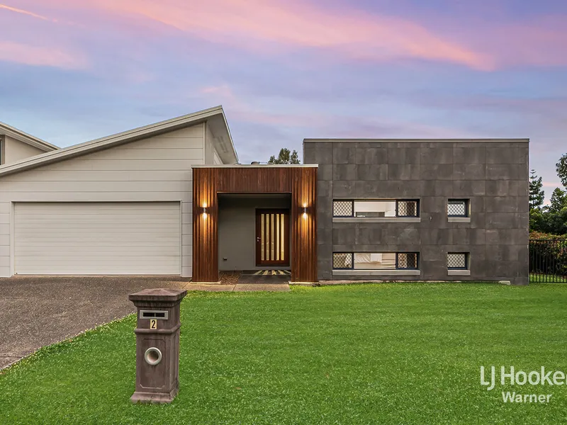 DECADENT DESIGN WITH QUALITY FINISHES BACKING ONTO THE LAKE!