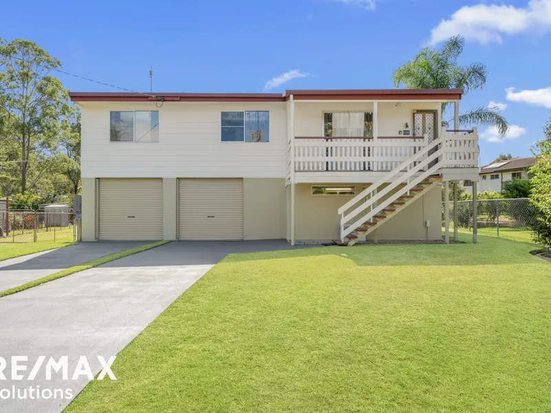 TRUE DUAL LIVING TUCKED AWAY IN A QUIET CULDESAC!