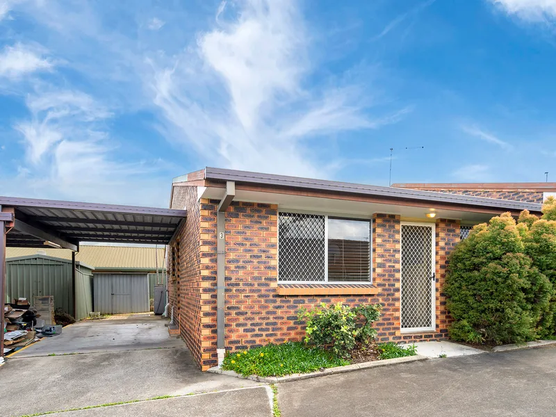 A Solid, Low-Set Unit In A Sought-After Location!