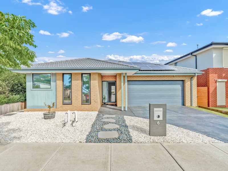 IMMACULATE THREE BEDROOM HOME