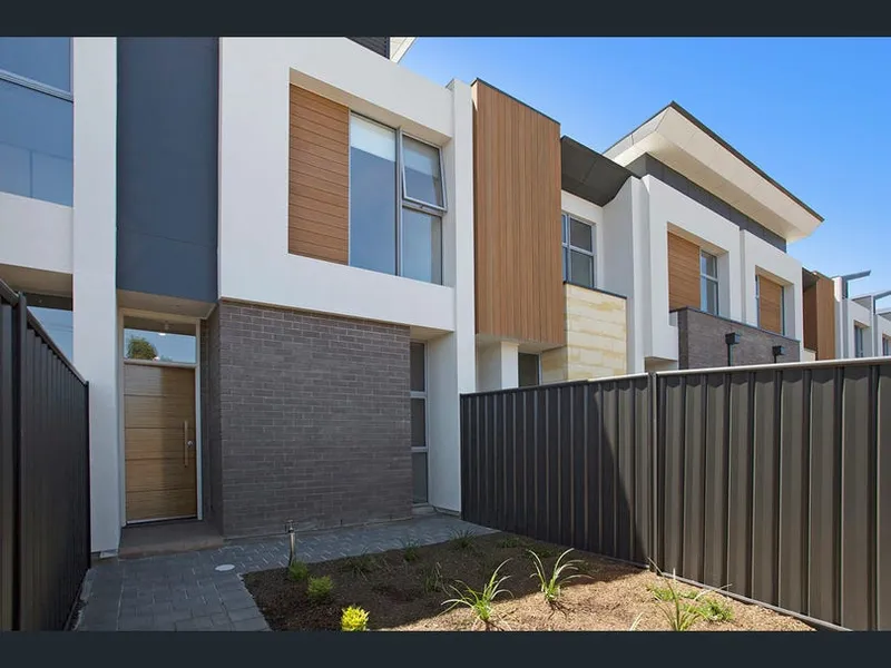 'IVY ON SAMPSON' Near New Townhouse Conveniently Positioned Close To Transport, Schools & Shopping Precincts.