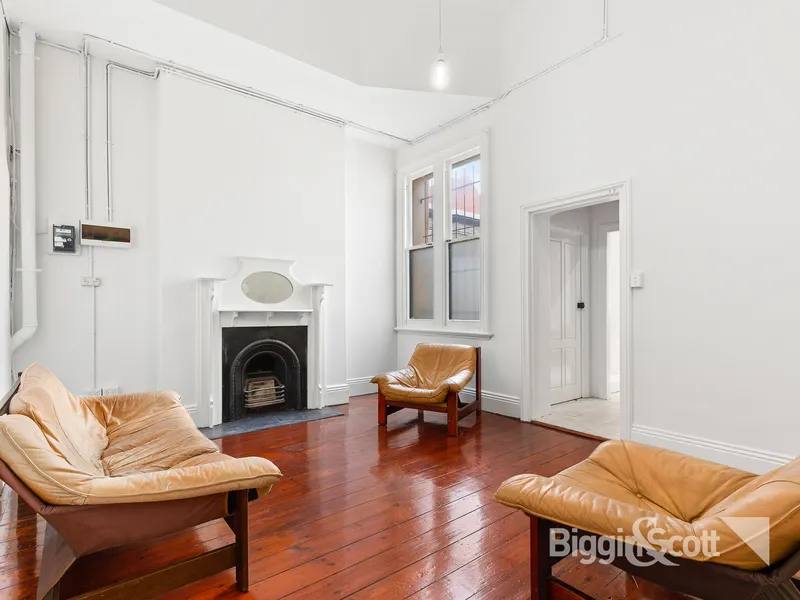 LARGE 2 STORY HOME WITH OFF STREET PARKING AND PRIVATE COURTYARD