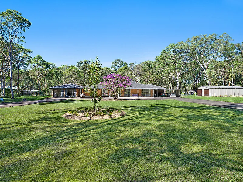 ACREAGE RETREAT WITH LOADS OF POTENTIAL