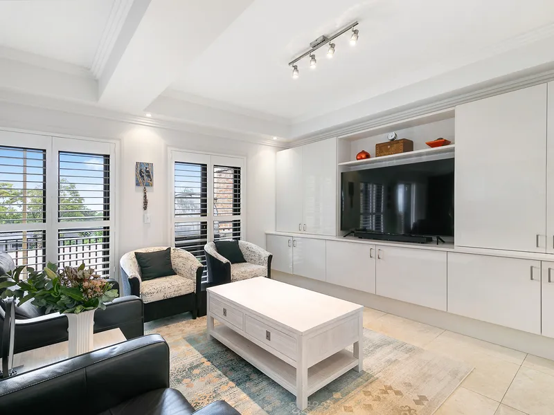 Embrace deluxe low maintenance living and walk-to-everywhere convenience