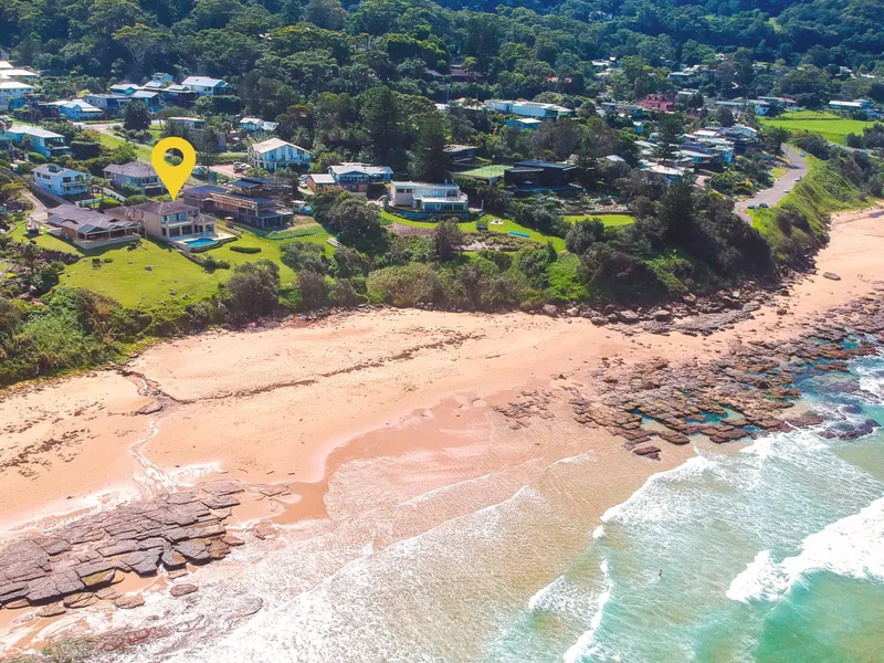 The Pinnacle of Beachfront Living!!!