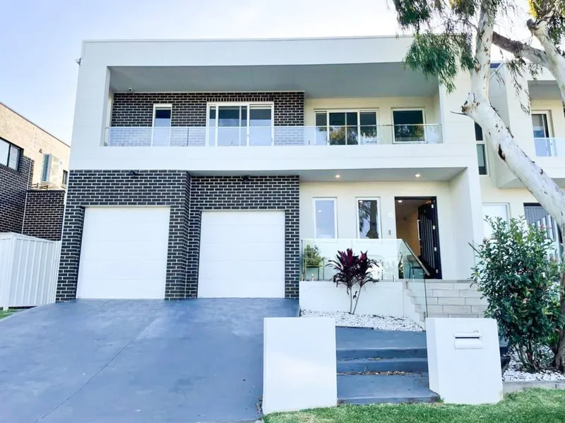 Stunning Duplex Home With Double Lock Up Garage