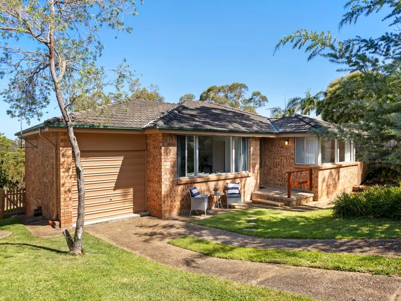 Single level brick home overlooking beautiful bush views