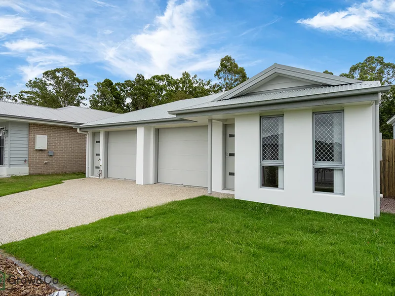 MODERN 2BED HOME WITH LARGE FULLY FENCED BACKYARD