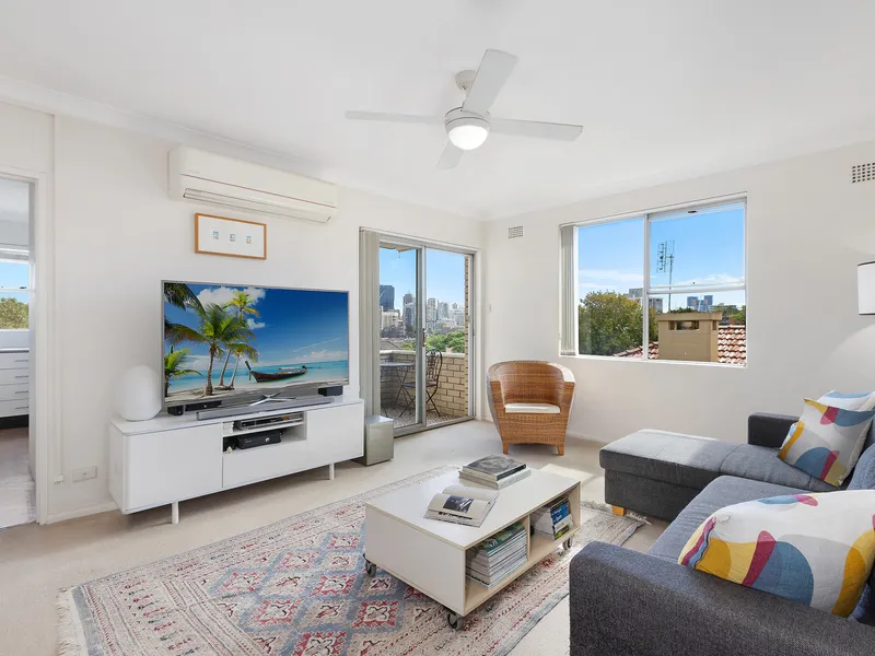 Light and airy apartment captures striking CBD views