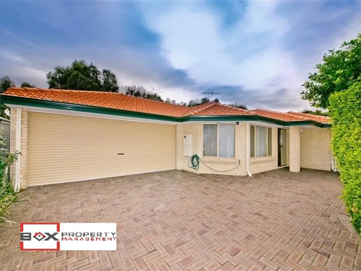 Neat and Secure 4 bedroom home, close to everything you need!