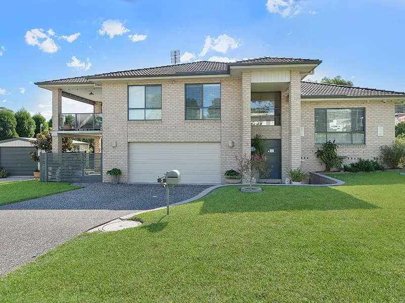 THE PERFECT LAKESIDE PROPERTY - ALMOST A WATERFRONT WITH ALL OF THE LAKE BENEFITS