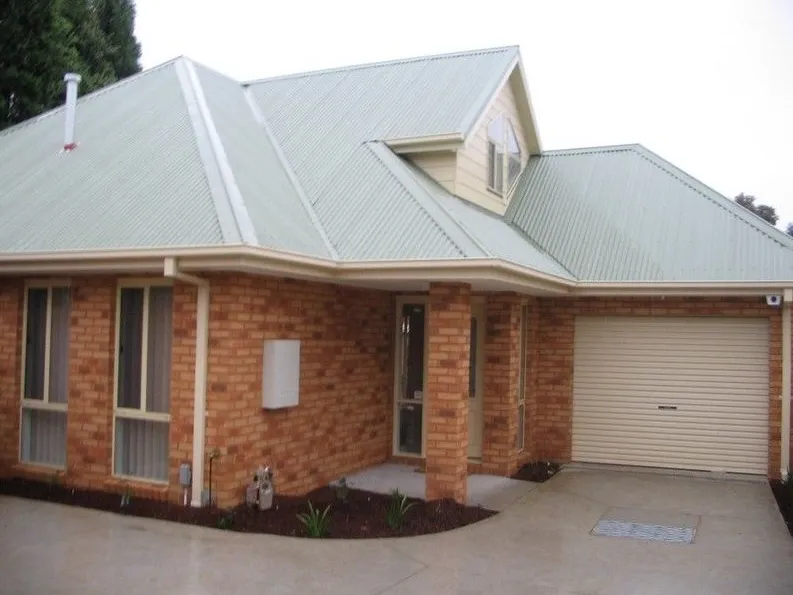 This 3 bedroom townhouse is one of two on the lot.