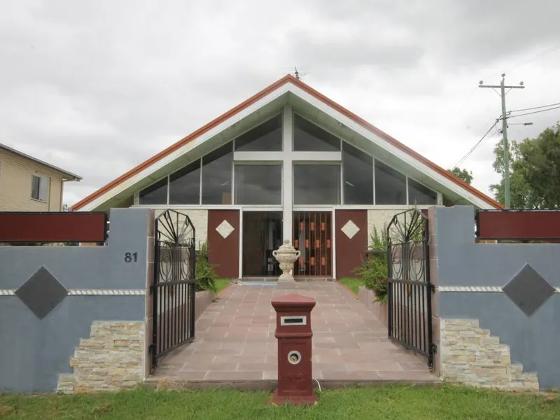 MAGNIFICENT LARGE RESIDENCE WITH OPEN PLAN LIVING AND HIGH CATHEDRAL CEILINGS.