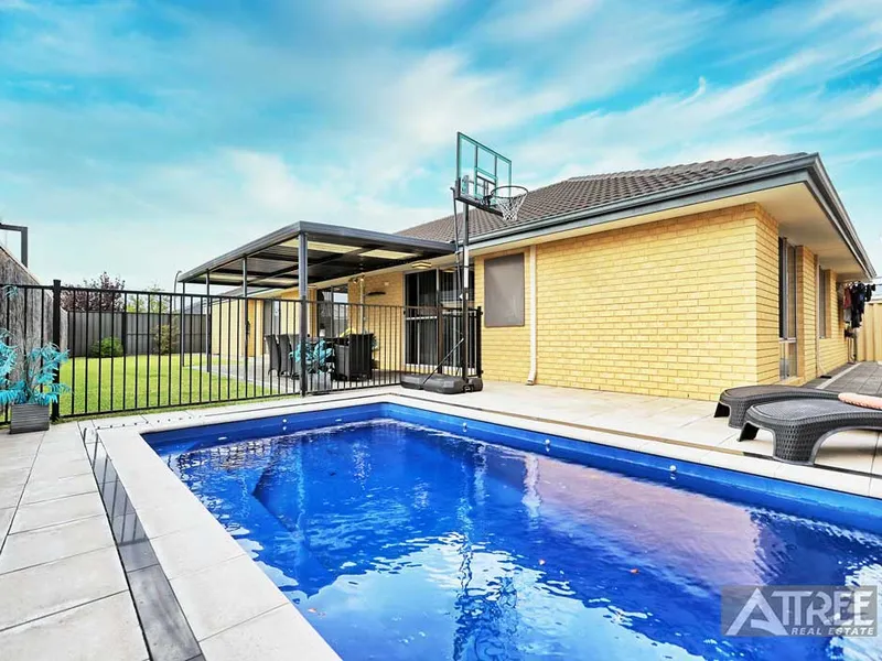 SPLASH INTO THIS FAMILY HOME!
