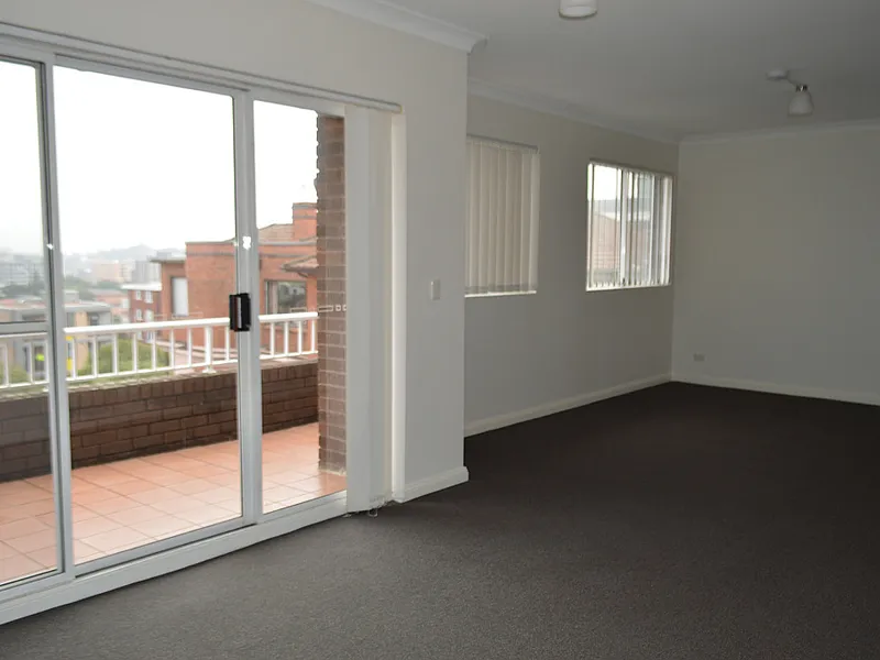 TOP FLOOR TWO BEDROOM APARTMENT 