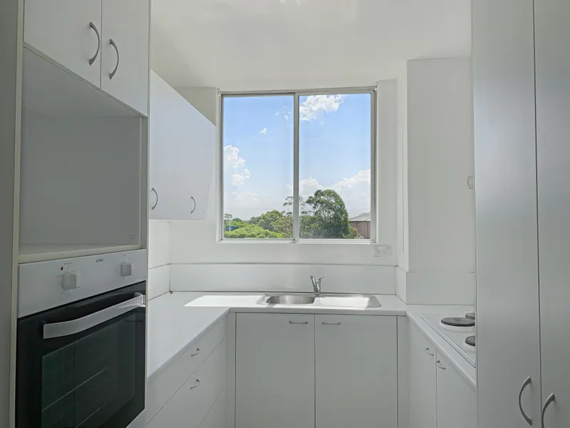 Freshly Painted & Carpeted Two-Bedroom Apartment with Pool & Sauna in the Complex