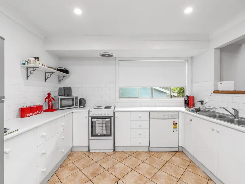 NESTLED AMONGST THE TREES