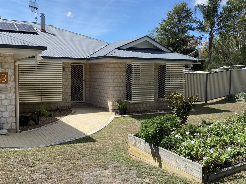 A Classy Number - Immaculate Brick Home on 1 Acre with Town Water and Sheds.
