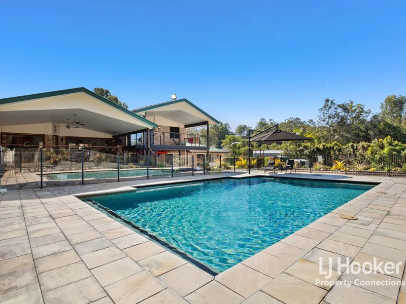 WELCOME TO 11 BUNYA PINE COURT, EATONS HILL - THE ULTIMATE IN ENTERTAINING!!