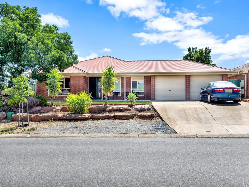 WHAT A BEAUTY! 4 BEDROOMS & 3 LVING AREAS