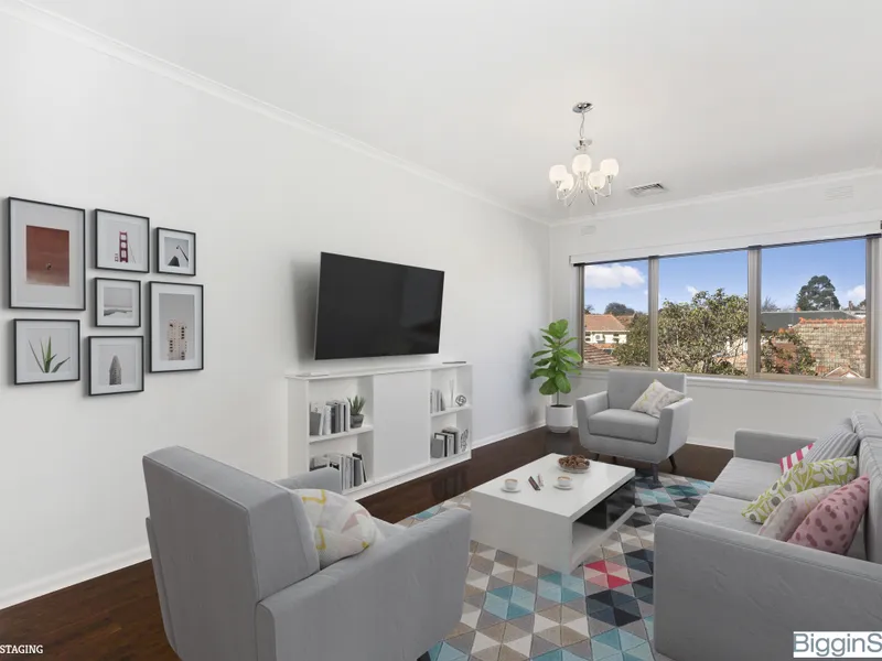 Neat and Spacious One Bedroom Apartment with Charming Rooftop Views