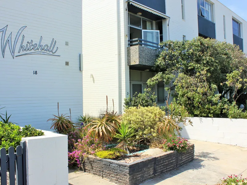 Sunsets and Sea Breezes in This Beachfront Position