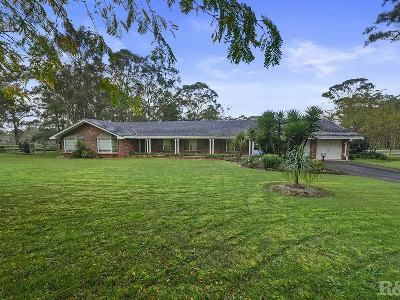 SPACIOUS HOME ON ACRES!