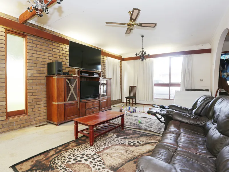 Quality living with Excellent Potential in Prime Location!