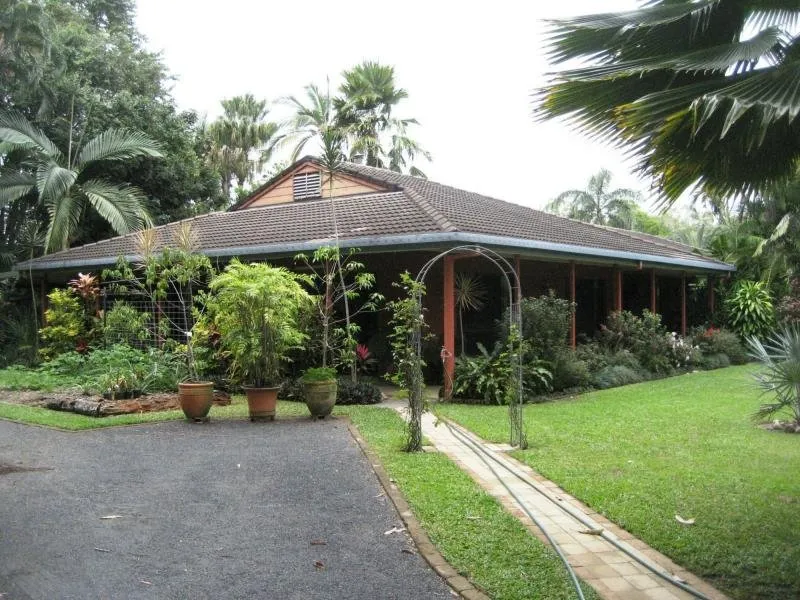 Grand and Gracious four  bedroom residence  surrounded by lush tropical gardens