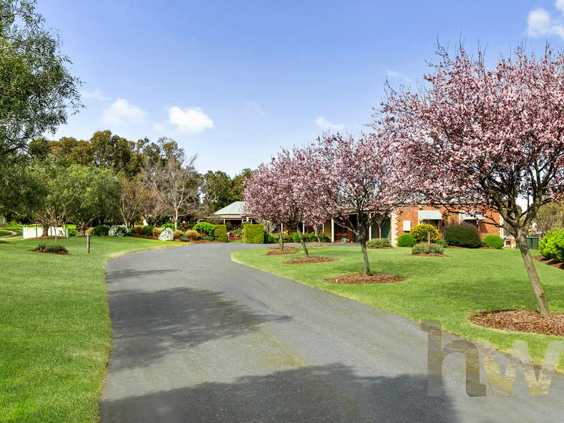 A Spacious Family Retreat On Picturesque Grounds!