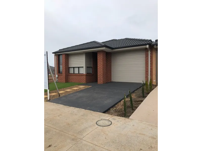 Low Maintenance Living Inside & Out!