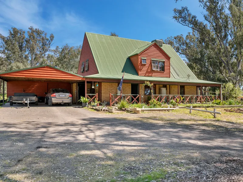 2 STOREY RED CEDAR - PRESSED MUD BRICK HOME - SET ON 1.87 ACRES (7600m2) - INSIDE TOWN BOUNDARY – 2 MINUTES WALK TO SHOPS – 4 BEDROOMS.