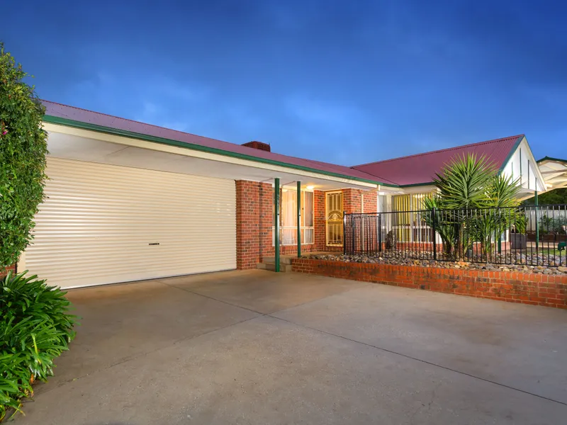 LOW MAINTENANCE HOME WITH BRILLIANT OUTDOOR ENTERTAINMENT AREA