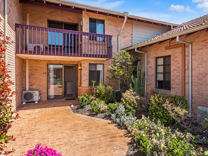 Apartment living at its best – Delightful home tucked away in one of the best pockets of the village